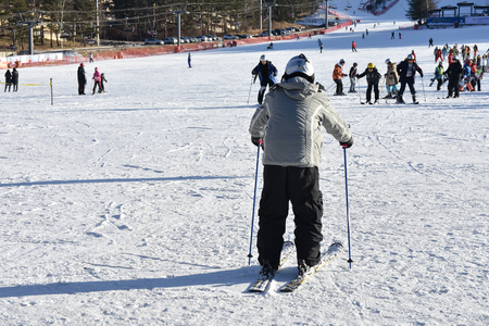 Seoul, KOREA  - JANUARY 28, 2017:  kid learning to ski on the slopesのeditorial素材
