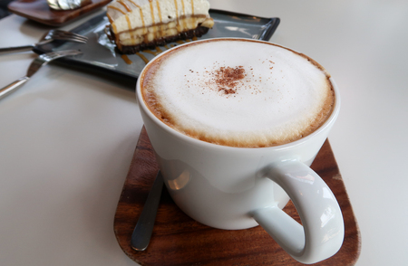 Cappuccino coffee isolated on white backgroundの写真素材