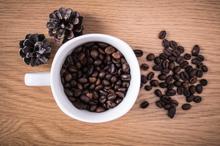 coffee beans and cup full of coffee