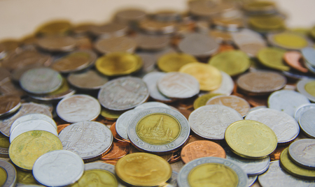 coins stacked on each other in different positionsの写真素材