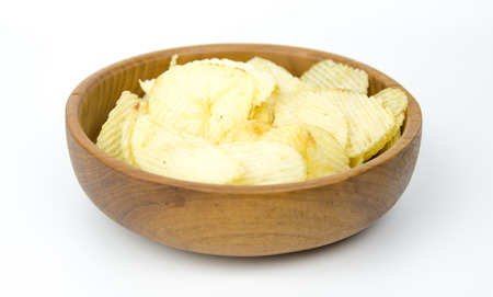 potato chips in an earthenware dishの写真素材