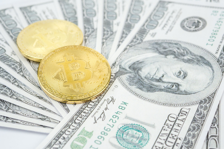 Bitcoin golden coin New virtual money and dollar backgroundの写真素材