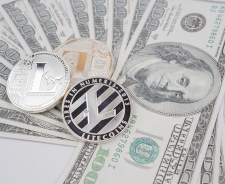 Litecoin golden coin New virtual money and dollar backgroundの写真素材
