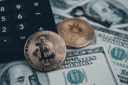 Bitcoin golden coin New virtual money and dollar backgroundの写真素材