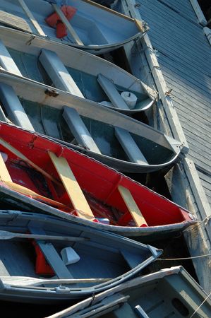 row boats tied to pierの写真素材