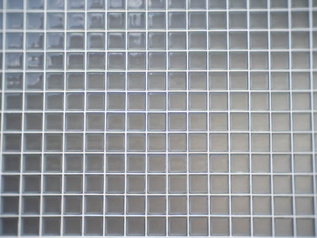 Cement wall with lined glassの写真素材