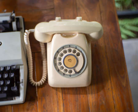 An old phone lying on the tableの写真素材