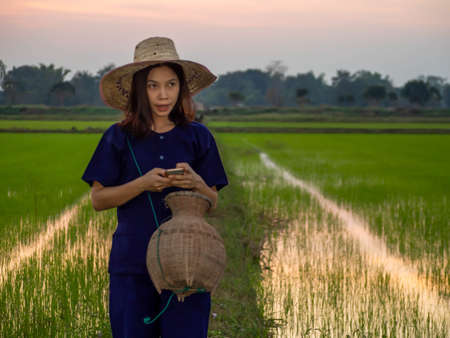 Young farmer wearing traditional Thai costumer