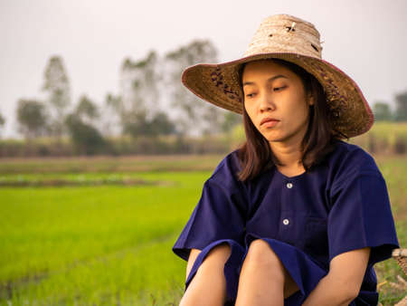 Young farmer wearing traditional Thai costumer