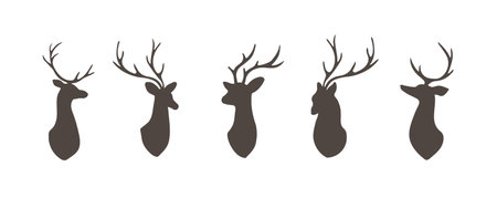 Set of deer heads. Black silhouettes wild animals with antlers on white background. Vector flat illustrationのイラスト素材