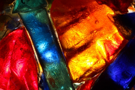 Closeup of back lit stained abstract glass patternの写真素材