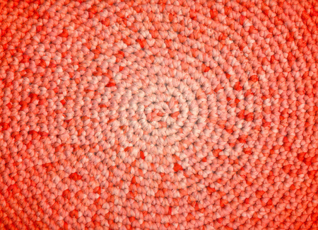 Closeup of crochet rag rug in white and yellow