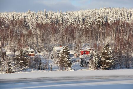 Villas in small Swedish town Ludvika, between the forest and the frozen lake.のeditorial素材
