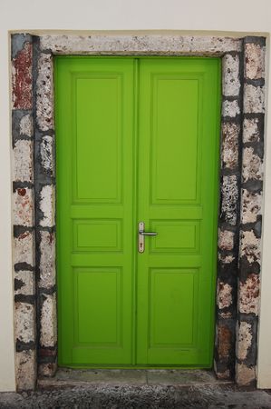 Coloured door in a house of Oia (Santorini island, Greece)