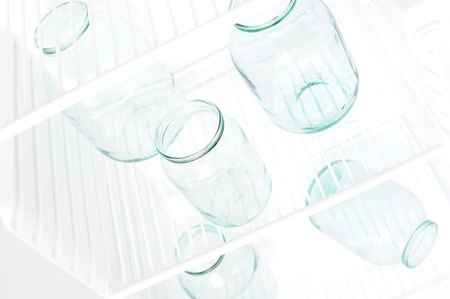 Glass jars in the fridgeの写真素材