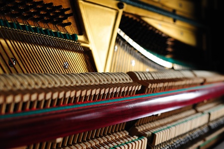 Strings and hammers inside of the old pianoの写真素材