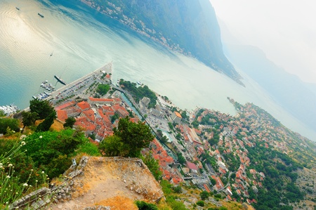 Ancient Kotor at sunset, angle top view to the Boka Kotorska bayの写真素材