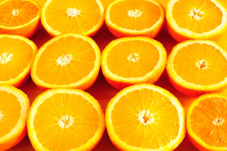 Orange halves creating bright background