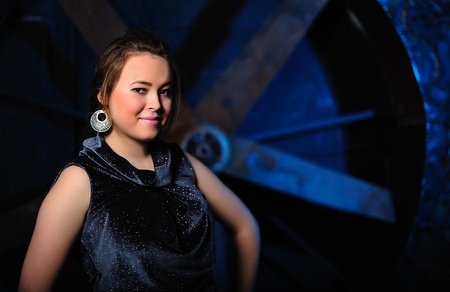 Portrait of an attractive young girl against grunge backgroundの写真素材