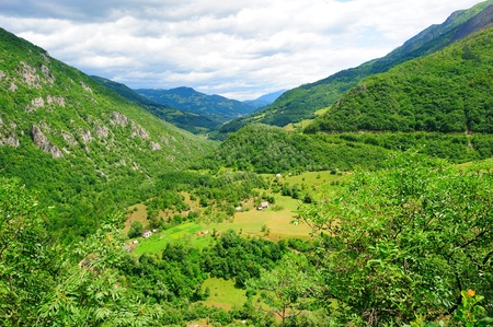 Serene green landscape high in the mountainsの写真素材