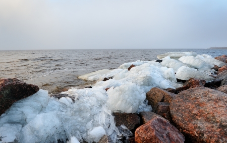 Rubble ice shoreline landscape in Kronstadt near St. Petersburg, Russiaの写真素材