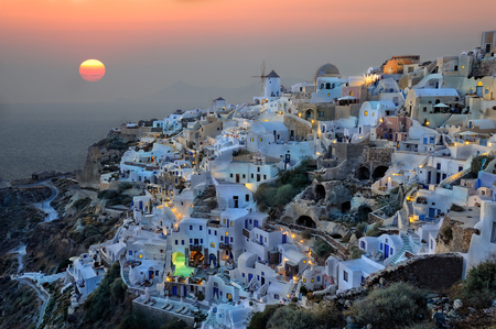 Amazing sunset at Oia village, Santorini island, Greeceの写真素材