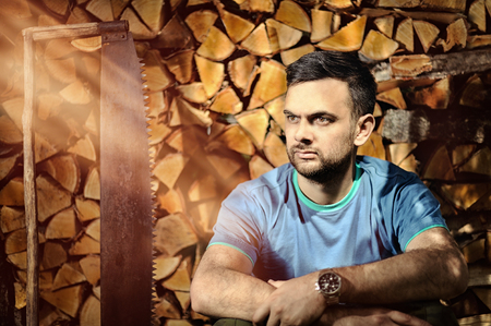 Bearded lumberjack resting after workの写真素材