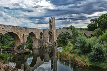View of medieval bridge of Besalu, Catalonia, Spainの写真素材