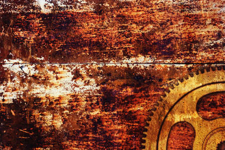 Grunge gear on rusty metal background