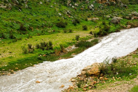 a water stream down the valleyの写真素材