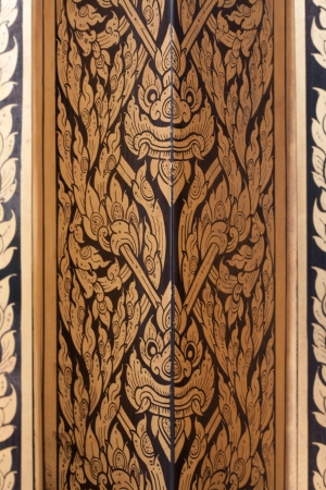 Details on the hinged door on the inside of an ancient templeの写真素材