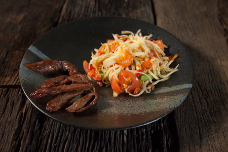 papaya salad and pork grillの写真素材