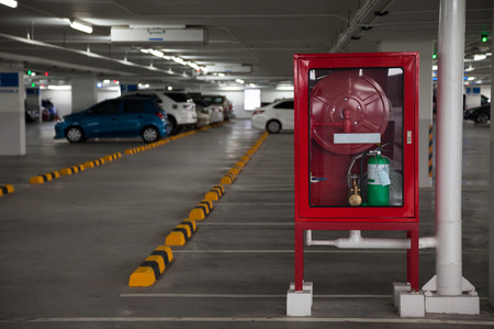 Cabinets for fire extinguishers in Parkingの写真素材