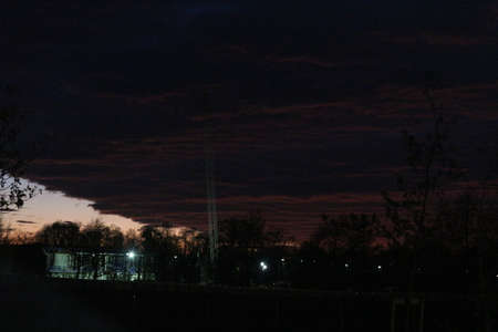 Sky at night light on the villageの写真素材