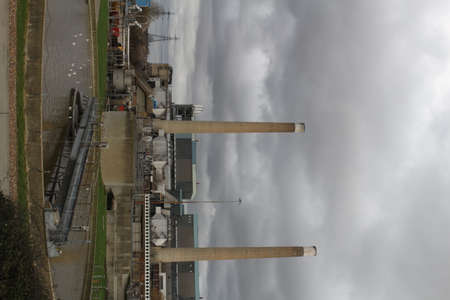 Old chimneys in the industrial buildingの写真素材