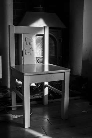High chair in the shadedark  light shadowの写真素材