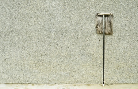 swab lean on the pebble wallの写真素材