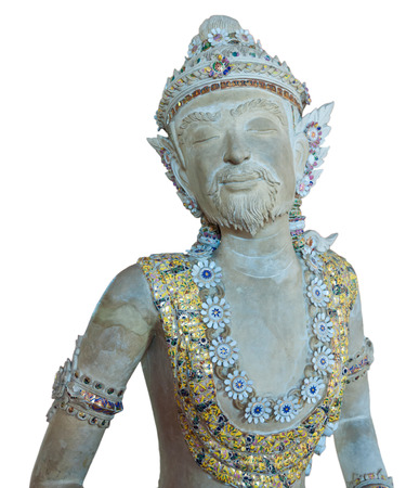 The male Gandharvas in Thai style which  made from cement and decorated by tile as isolated pictureの写真素材
