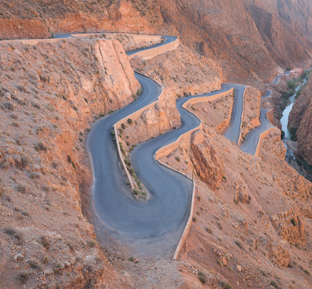 The zigzag road to Gorges du Dades valley during end of winter and beginning of spring on March 2014 in Gorges du Dades or DadÃ¨s Gorges city which located in Moroccoの写真素材