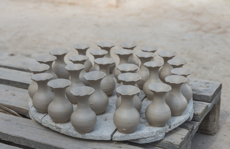 The group of wet pottery vase dry under the sun in pottery factory name Serghini Maitre Potier et Zellige Fassi in Fes, Moroccoの写真素材