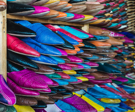 The colorful traditional handbag of Morocco made from leather as isolated pictureの写真素材