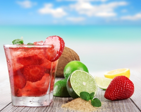 Fruit cocktail on a beach の写真素材