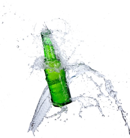 Beer bottle with water splashの写真素材