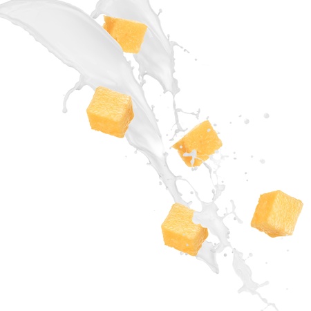 Pine apples in cream splash over white background の写真素材