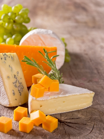 Various types of cheese on woodの写真素材