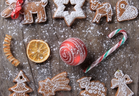 Traditional gingerbread cookies over wooden backgroundの写真素材