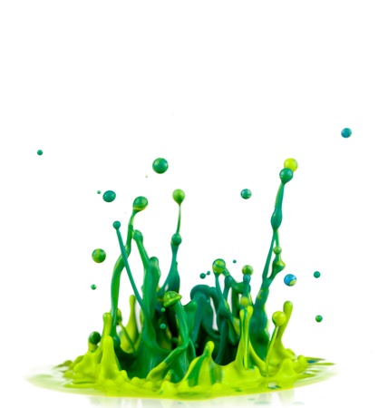 Colorful paint splashing on white backgroundの写真素材