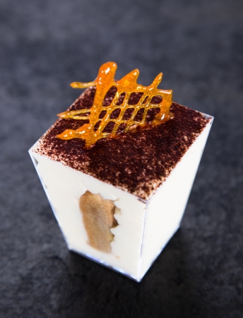 Delicious cake on black stone tableの写真素材