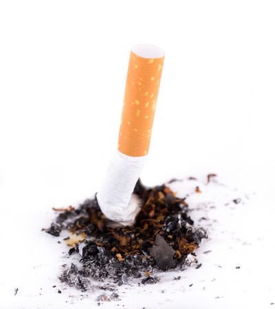 consumed cigarettes on white backgroundの写真素材