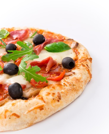 Delicious italian pizza over white backgroundの写真素材